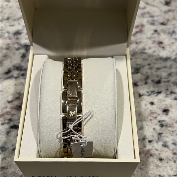Anne Klein Gold and White Roman Numeral Watch